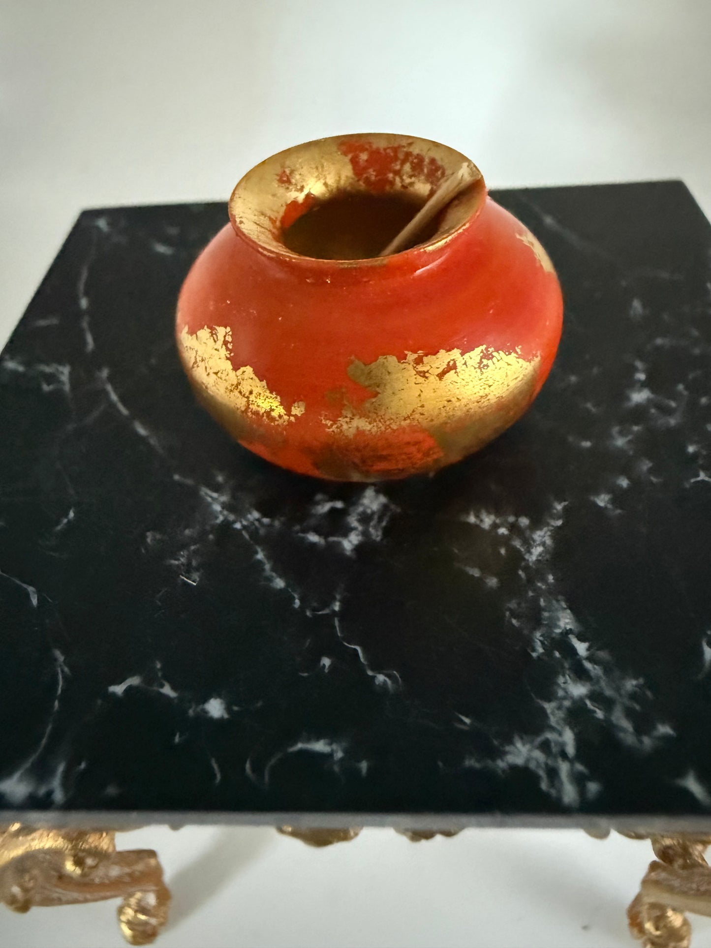 orange and gold pot