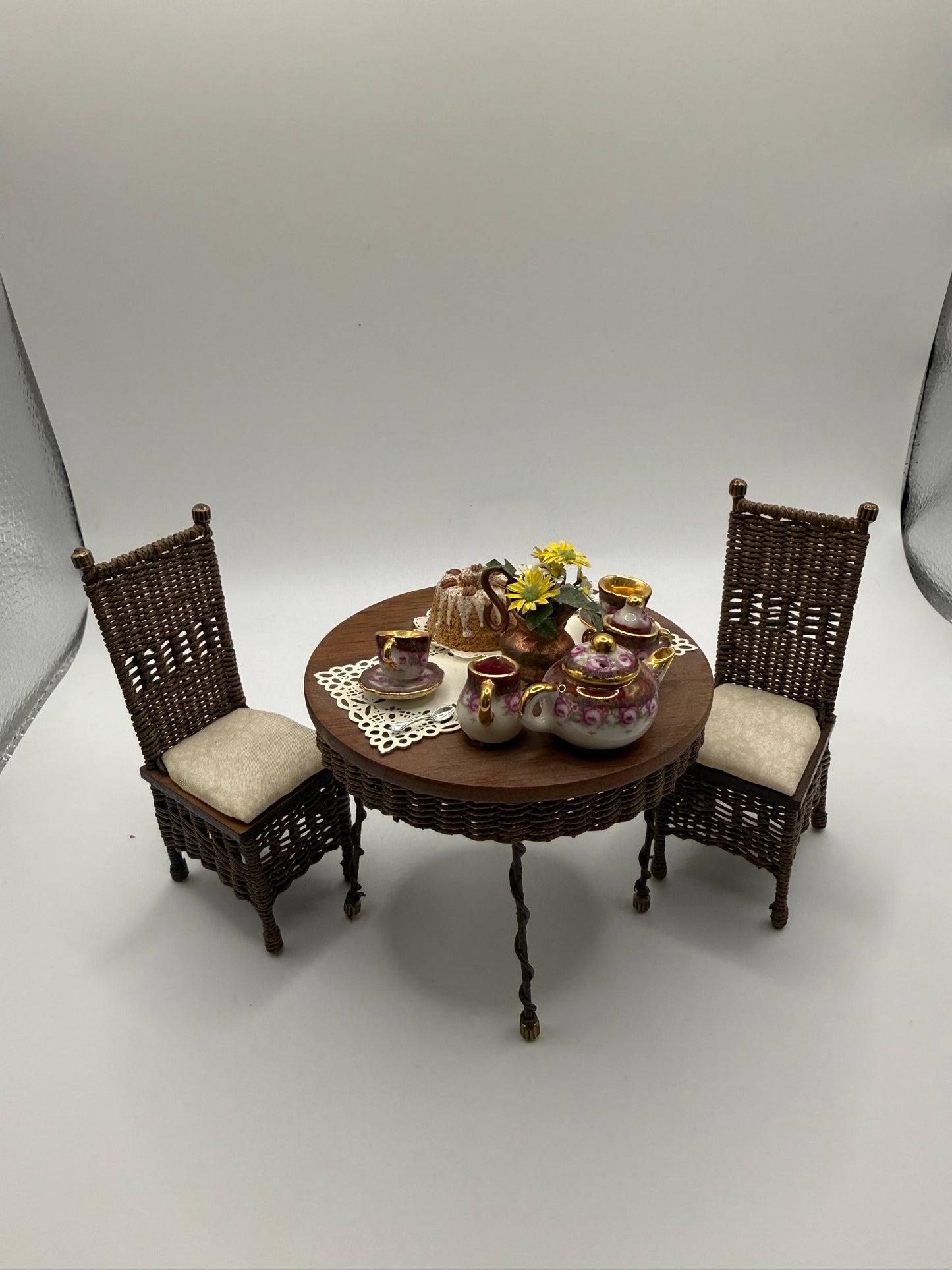 Wicker table and chairs with china