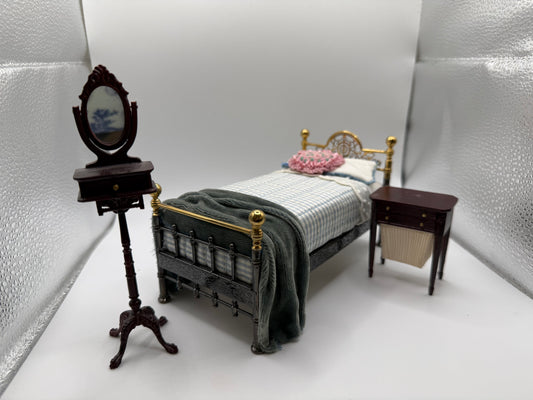 Brass bed and Bespaq shaving mirror and nightstand