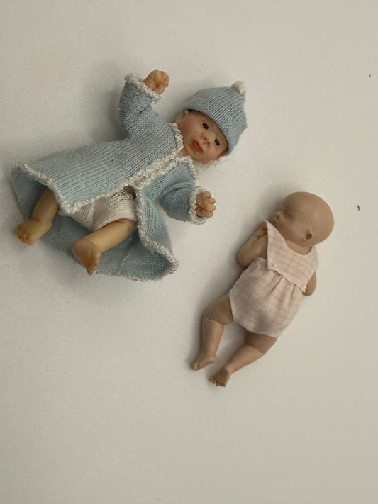 2 porcelain baby dolls