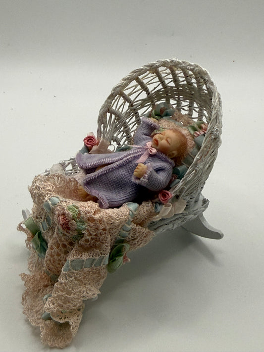 Bassinet with baby