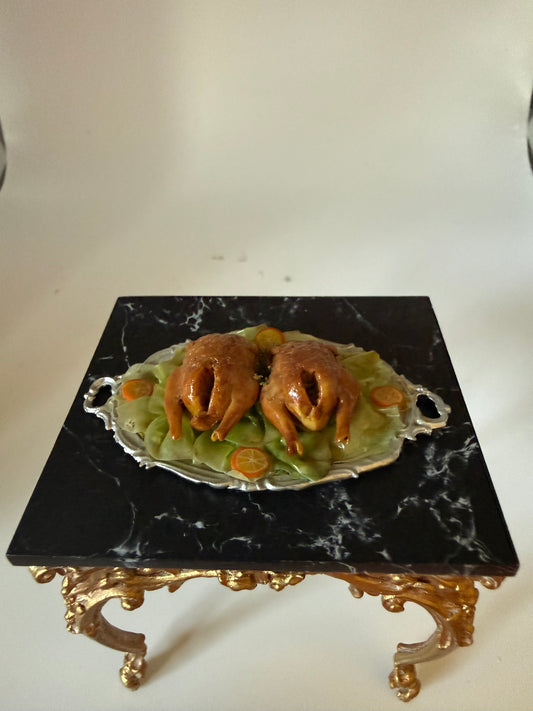 Two Chickens On a platter