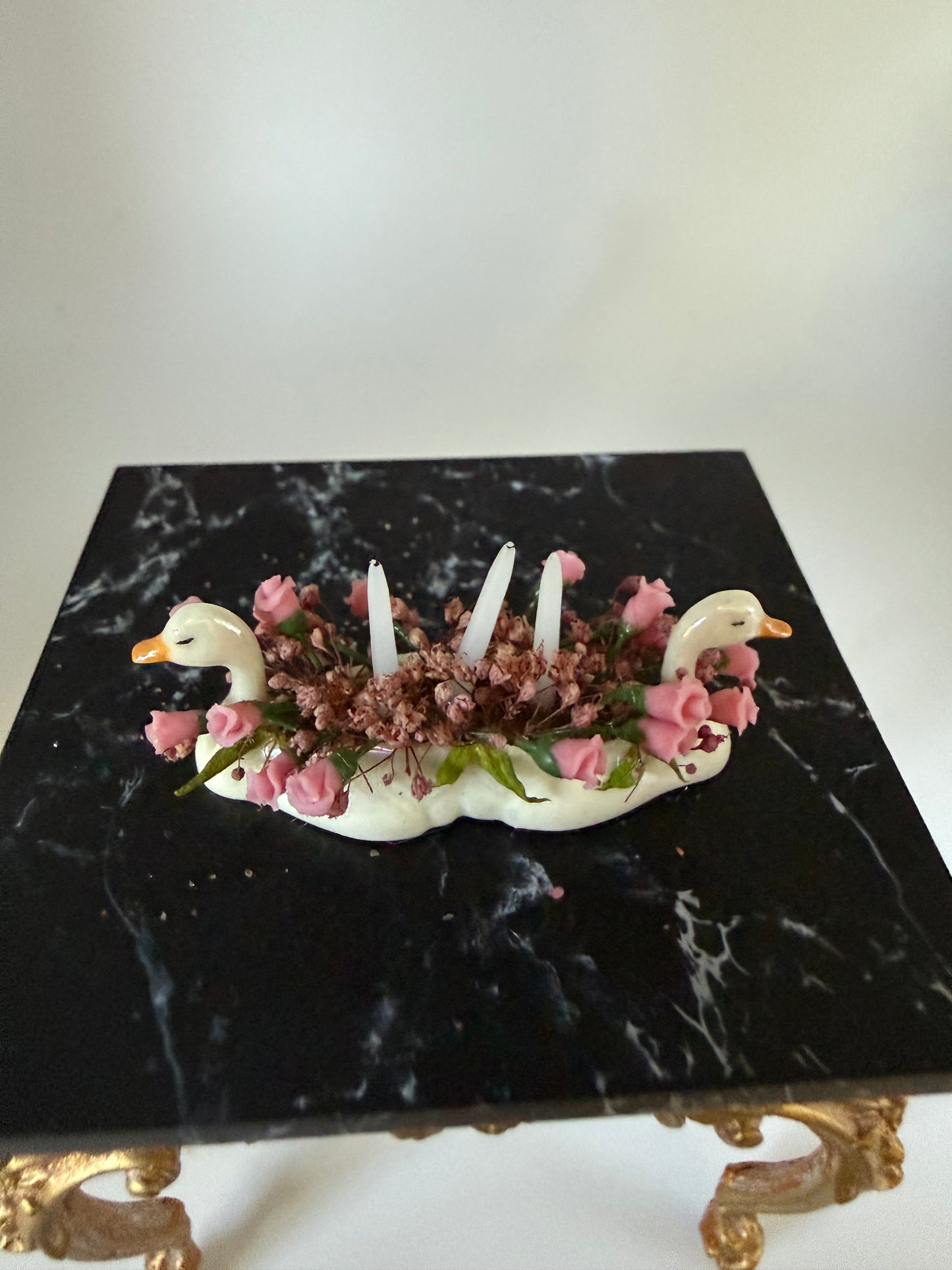 Swan vase with candles
